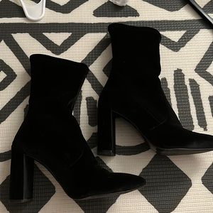 Black Stuart Weitzman boots leather sole